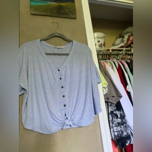 periwinkle loose buttoned shirt, with tied knot at bottom